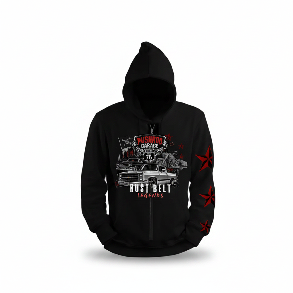 A black zip-up hoodie with a graphic print on the front and red star accents on the sleeves, displayed against a white background.