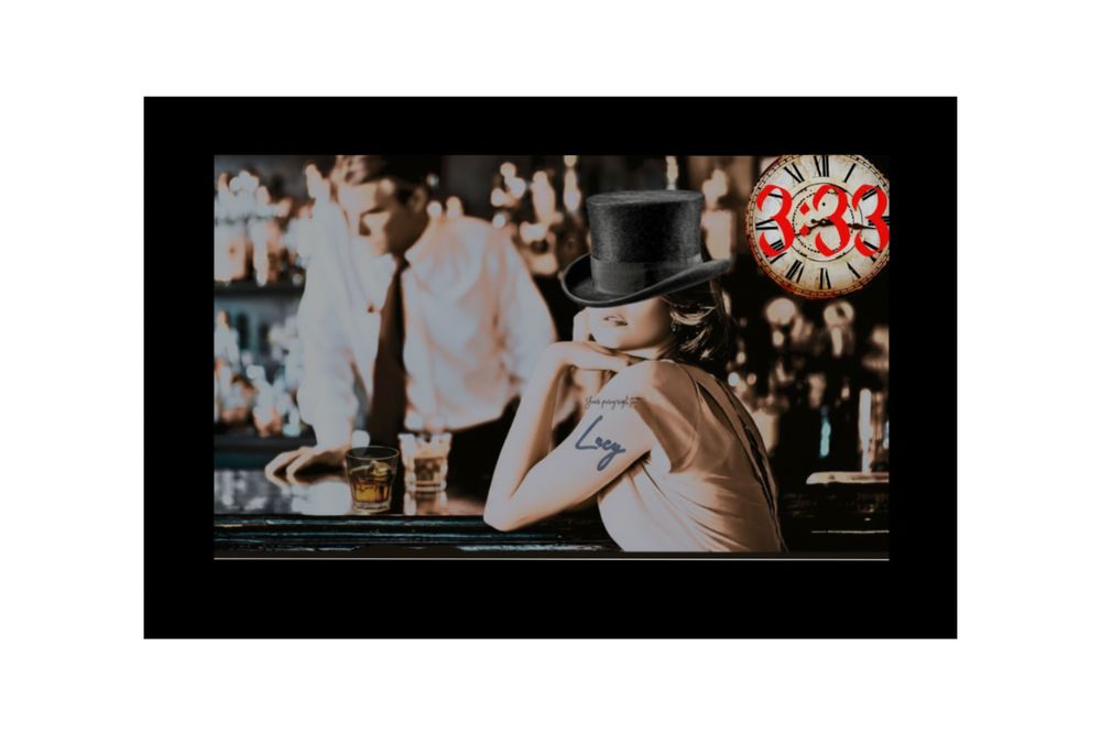 Vera wearing a top hat, with a blurred background and a clock with Roman numerals '333' in the corner.